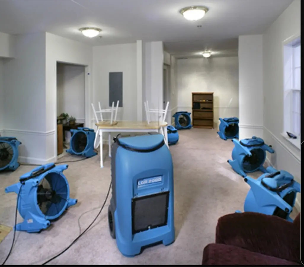 Air movers and dehumidifier setup for Water Damage Restoration in East Flat Rock